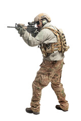 American ranger in military equipment and with a rifle aiming and shoots on a white background, portrait of a special forces soldier with weapons
