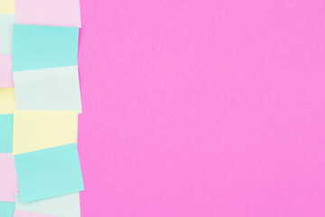 Sticky note background with multi-color notes with bright pink paper