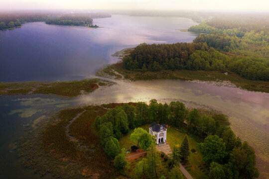 Panorama of the Studzieniczne Lake with the Chapel of the Virgin Mary in Studzieniczna. Augustow, Poland.