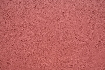 Fototapeta premium Large surface with a pleasant pink reddish background color, fine grained structure and unique texture