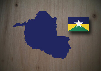 Map and flag of the province of Rondonia, Brazil, wooden background, 3D illustration