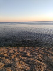 sunrise or sunset on the beach, ocean.