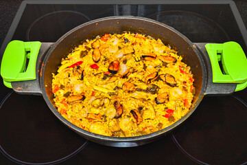 spanish paella with sea fish and shrimps.