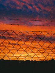 fence with sunset