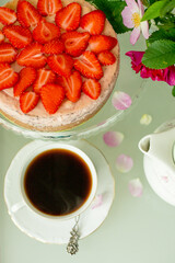 cup of tea with strawberry