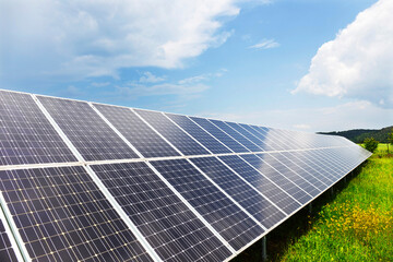 Solar Power Station on the spring flowering Meadow 