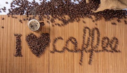 coffee beans forming drawings and phrases for those who love coffee