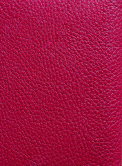 Red Leather Background. Red leather texture closeup background. Structured background design leather. A place for text or a logo. Beauty and Fashion. Red leather jacket.