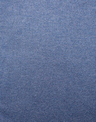 Blue natural texture of knitted wool textile material background. Blue cotton fabric woven canvas texture. Knitted realistic seamless background of blue color.
