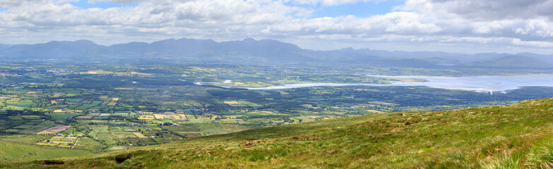Fototapeta na wymiar Panoramic View of Castlemaine Harbour and the Iveragh Peninsula from the Southern Slopes of the Slieve Mish Mountains on the Wild Atlantic Way in County Kerry, Ireland