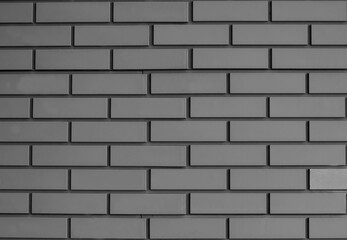 Fototapeta premium textured brick wall. White and orange masonry bricks.