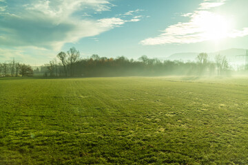 Morning sunny rural landscape with agricultural fields and areas, Austria.