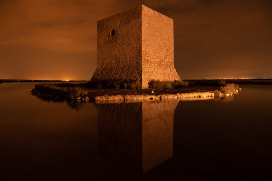 tamarit tower in salty lagoon in santa pola