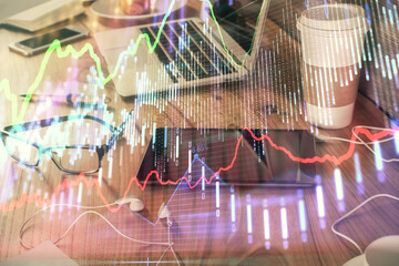 Double exposure of financial graph drawing and cell phone background. Concept of forex trading
