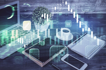 Double exposure of financial graph drawing and cell phone background. Concept of forex trading