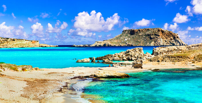 Lefkos Karpathos Greece panorama. Greek islands Dodecanese. tropical  water and rocky beach view.  Turquoise sea landscape. Travel destination. High resolution 10K.