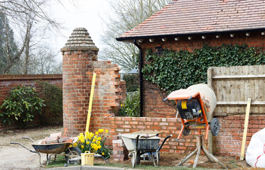 Construction work, brick laying, contructing garden wall, UK