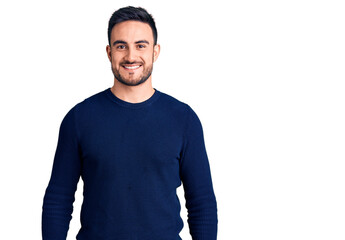 Young handsome man wearing casual clothes with a happy and cool smile on face. lucky person.