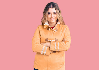 Young caucasian woman wearing casual clothes happy face smiling with crossed arms looking at the camera. positive person.