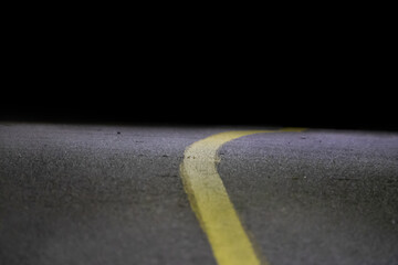 Yellow line on the asphalt