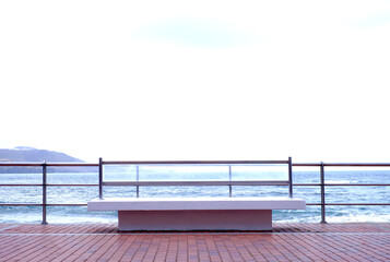 Empty bench on a sea promenade.