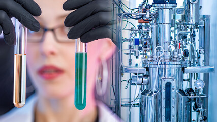 Work with a bioreactor. woman holds test tubes in the face. Concept - girl holds a virus and...