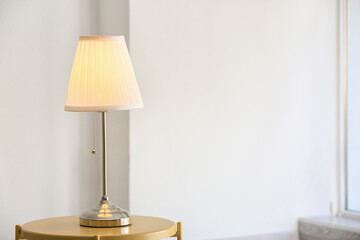 Modern lamp on table in room