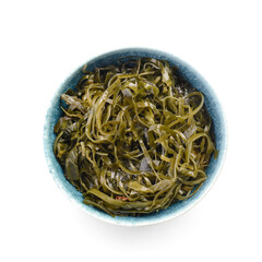 Bowl with tasty seaweed on white background