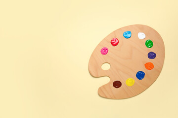 Artist's palette on color background