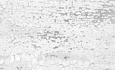 Old crackled black and white painted surface. Vintage wooden wall or floor with cracked paint.
