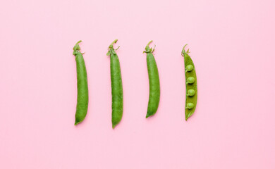 Tasty fresh peas on color background