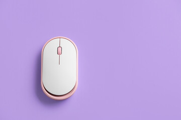 Modern computer mouse on color background