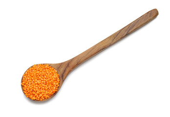 Spoon with lentils on white background