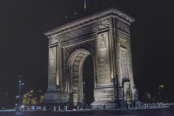 Front view of Arch of Triumph at night 