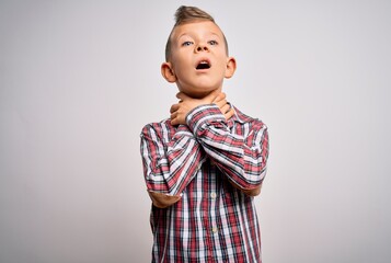 Young little caucasian kid with blue eyes wearing elegant shirt standing over isolated background shouting suffocate because painful strangle. Health problem. Asphyxiate and suicide concept.