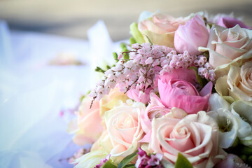 Floral wedding bouquet in natural garden setting