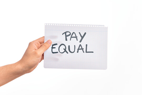 Cardboard banner protesting for equal payment for women and men over isolated white background