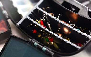 Fishing lures in a lightweight portable fishing tackle box.