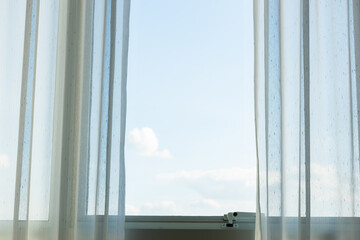 white curtain on glass window
