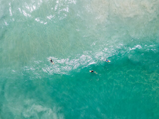 Aerial View Of Wave In Ocean And Surfers. Surfing And Waves