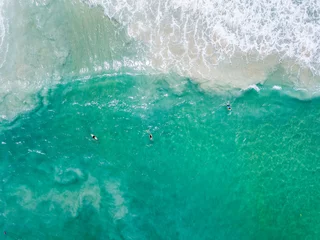 Foto op Canvas Aerial View Of Wave In Ocean And Surfers. Surfing And Waves © wonderisland