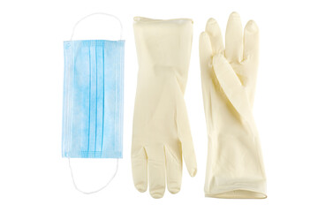 Blue medical face mask and sterile rubber gloves isolated on white background.