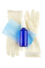 Antiseptic spray, blue medical face mask and sterile rubber gloves isolated on white background.