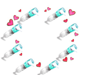 Sanitizer bottles with hand drawing hearts - flat lay