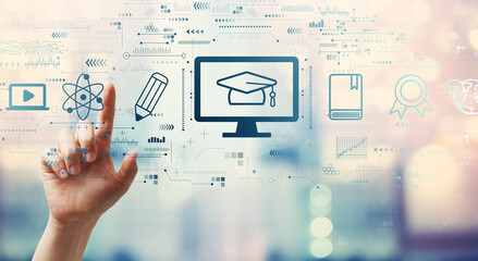 E-learning concept with hand pressing a button on a technology screen