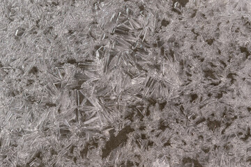Pieces of ice for backdrop. Crystals of frozen water in a chaotic disposition. Glare. Concept of cold, freshness, winter.