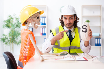 Funny construction business meeting with boss and skeletons