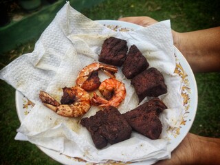 Fried fish and prawns on a plate