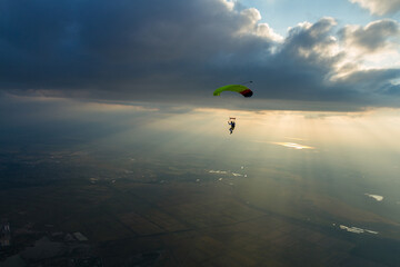 Piloting the parachute in the clouds.