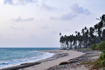 Dramatic and cool seashore under cloudy sky in Phoe Kalar Island, Chaung Thar Beach, Myanmar.